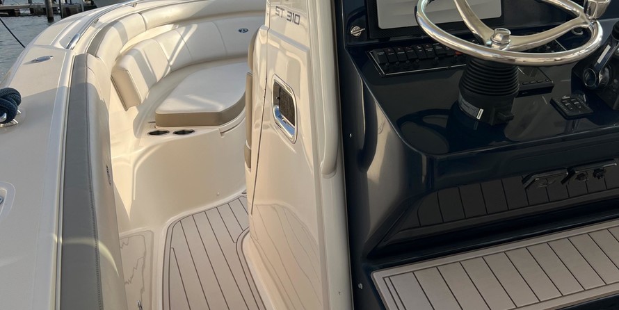 Pursuit st 310 sport