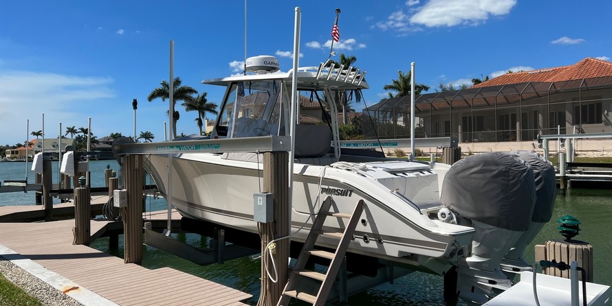 Pursuit st 310 sport